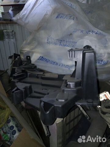 Крепление переднего бампера правое флюенс