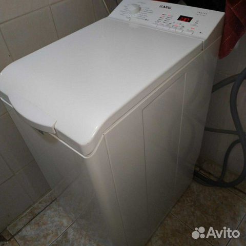 AEG с вертикальной загрузкой 6 кг 1200 об AEG с вертикальной загрузкой 6 кг 1200 об