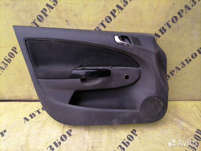 Обшивка двери передней левой Opel Corsa D