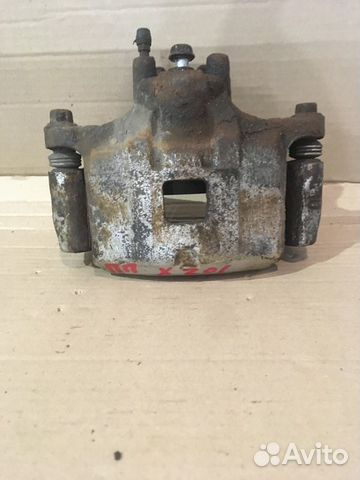 Суппорт передний правый Mitsubishi Lancer 10