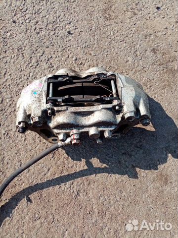 Суппорт передний правый Mitsubishi Pajero 4 3.2D