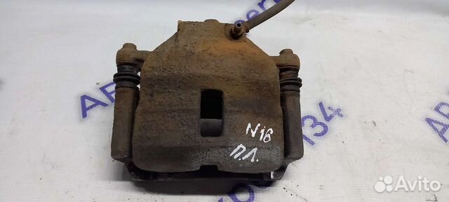 Суппорт передний левый Nissan Almera N16