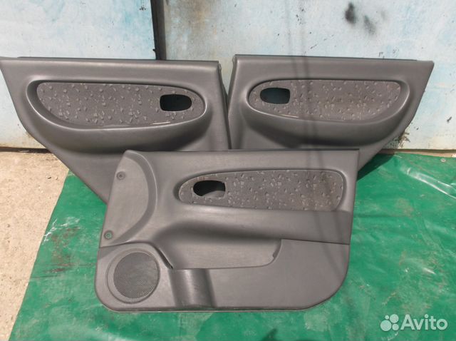 На Кия Спектра обивки дверей