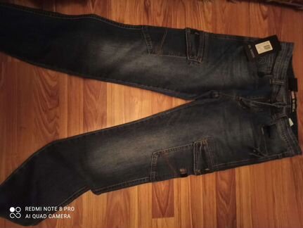 Джинсы новые